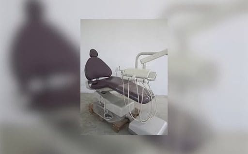 A gray dental chair